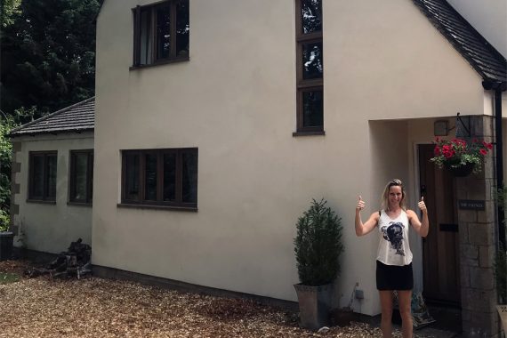 modern-machine-rendered-house-in-cirencester-with-happy-homeowner