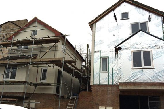 timber frame house with external wall insulation installed before colour render applied